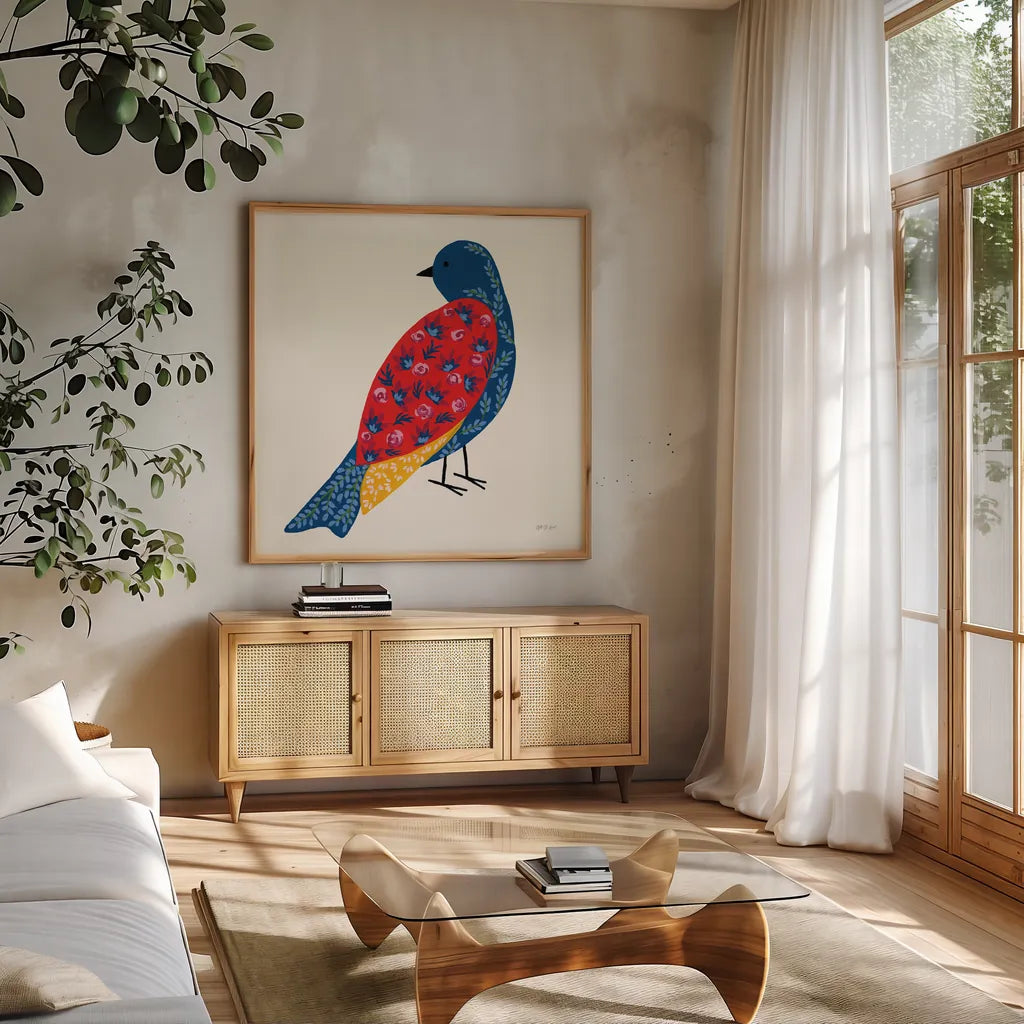 Blooming Bird IV by Yvette St. Amant. Shown in a natural wood frame in a cozy modern living room. Available as an archival giclee rolled canvas, fine art paper, or poster print. SKU 92588a.