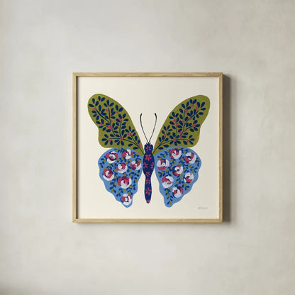 Blooming Butterfly I by Yvette St. Amant. Shown in a natural wood glass frame for a timeless modern aesthetic. Available as an archival giclee rolled canvas, fine art paper, or poster print. SKU 91172a.