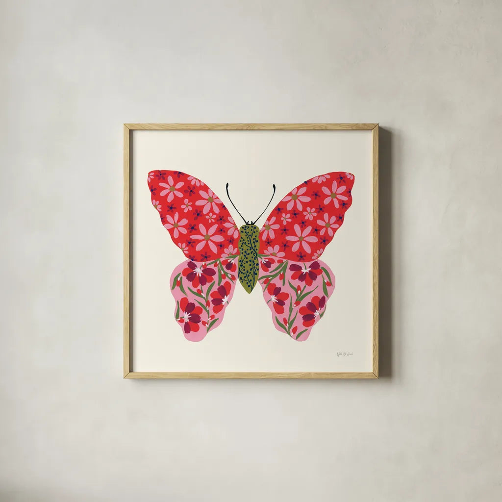 Blooming Butterfly II by Yvette St. Amant. Shown in a natural wood glass frame for a timeless modern aesthetic. Available as an archival giclee rolled canvas, fine art paper, or poster print. SKU 91173a.