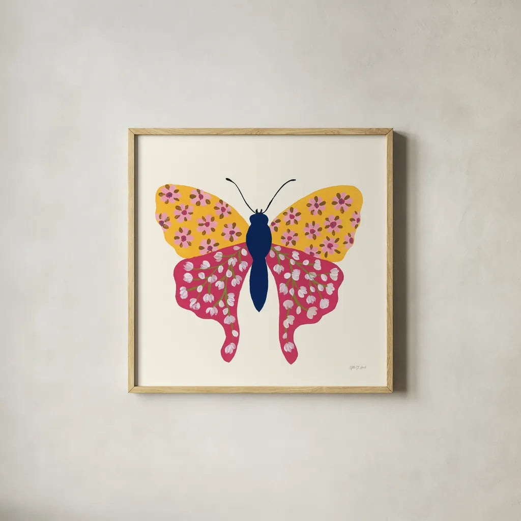 Blooming Butterfly IV by Yvette St. Amant. Shown in a natural wood glass frame for a timeless modern aesthetic. Available as an archival giclee rolled canvas, fine art paper, or poster print. SKU 91175a.