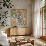 Botanical Mosaic IV by Yvette St. Amant. Shown in a natural wood frame in a cozy modern living room. Available as an archival giclee rolled canvas, fine art paper, or poster print. SKU 96218a.