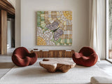 Botanical Mosaic IV by Yvette St. Amant. Shown as extra-large giant wall art in a modern living room. Available as an archival giclee rolled canvas, fine art paper, or poster print. SKU 96218a.
