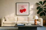 Cherry Hearts by Yvette St. Amant. Displayed in a glass frame with matte in a clean modern living room. Available as an archival giclee rolled canvas, fine art paper, or poster print. SKU 98246a.