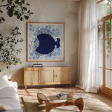 Coastal Chinoiserie VI by Yvette St. Amant. Shown in a natural wood frame in a cozy modern living room. Available as an archival giclee rolled canvas, fine art paper, or poster print. SKU 91027a.