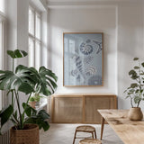 Coastal Shells I by Yvette St. Amant. shown as a print in a natural wood frame in a dining room. Available as a archival giclee rolled canvas, fine art paper, or poster print. SKU 88368h.