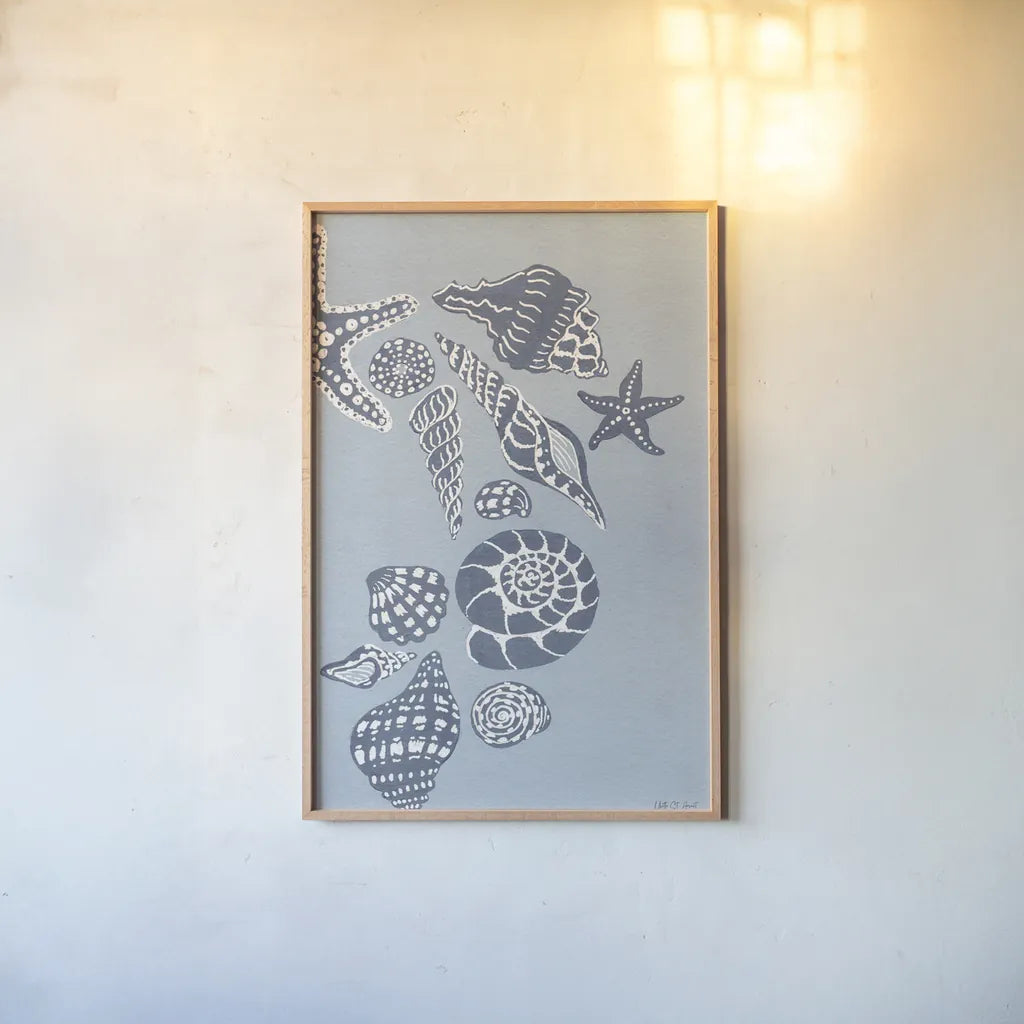 Coastal Shells II by Yvette St. Amant. shown as a paper print in a natural frame. Available as a archival giclee rolled canvas, fine art paper, or poster print. SKU 88369h.