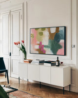 Color Burst II by Yvette St. Amant. shown as a framed stretched canvas in a living room above a console. Available as a archival giclee rolled canvas, fine art paper, or poster print. SKU 88228i.