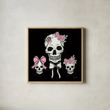 Coquette Skulls by Yvette St. Amant. Shown in a natural wood glass frame for a timeless modern aesthetic. Available as an archival giclee rolled canvas, fine art paper, or poster print. SKU 94021a.
