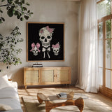 Coquette Skulls by Yvette St. Amant. Shown in a natural wood frame in a cozy modern living room. Available as an archival giclee rolled canvas, fine art paper, or poster print. SKU 94021a.