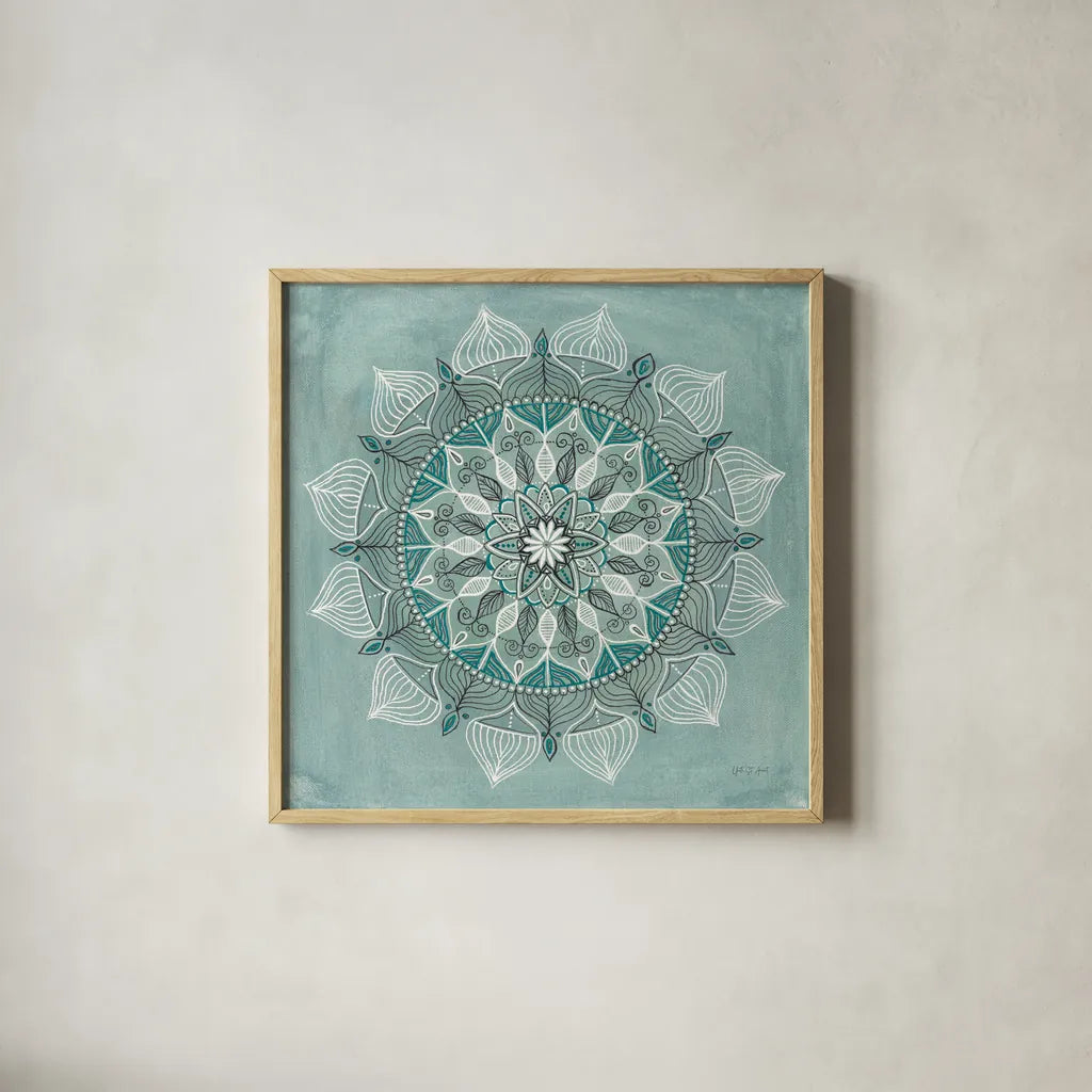 Desert Mandala Green by Yvette St. Amant. Shown in a natural wood glass frame for a timeless modern aesthetic. Available as an archival giclee rolled canvas, fine art paper, or poster print. SKU 91001a.