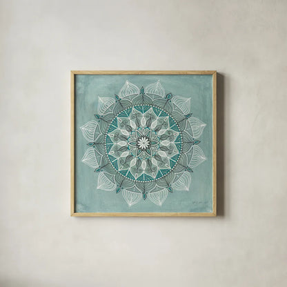Desert Mandala Green by Yvette St. Amant. Shown in a natural wood glass frame for a timeless modern aesthetic. Available as an archival giclee rolled canvas, fine art paper, or poster print. SKU 91001a.
