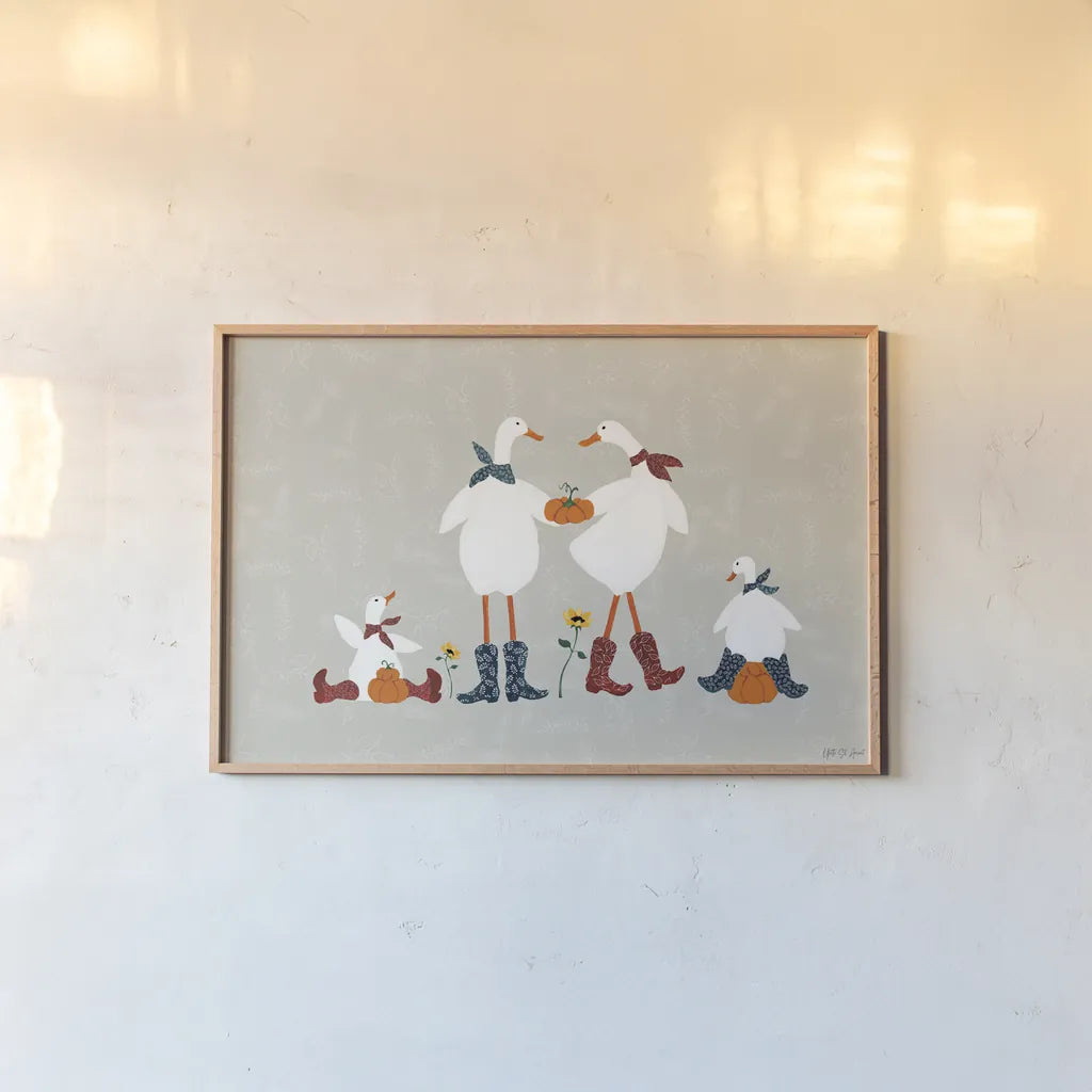Ducks in the Pumpkin Patch VI by Yvette St. Amant. shown as a paper print in a natural frame. Available as a archival giclee rolled canvas, fine art paper, or poster print. SKU 97329i.