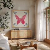 Folk Butterfly VI by Yvette St. Amant. Shown in a natural wood frame in a cozy modern living room. Available as an archival giclee rolled canvas, fine art paper, or poster print. SKU 92336a.