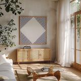 Geo Abstract IV by Yvette St. Amant. Shown in a natural wood frame in a cozy modern living room. Available as an archival giclee rolled canvas, fine art paper, or poster print. SKU 103105a.