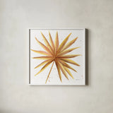 Golden Palm I by Yvette St. Amant. Shown in a crisp white glass frame for a clean and minimalist style. Available as an archival giclee rolled canvas, fine art paper, or poster print. SKU 89175a.