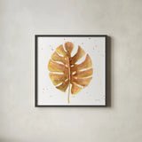 Golden Palm II by Yvette St. Amant. Shown in a sleek black glass frame for a contemporary gallery look. Available as an archival giclee rolled canvas, fine art paper, or poster print. SKU 89176a.