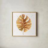 Golden Palm II by Yvette St. Amant. Shown in a natural wood glass frame for a timeless modern aesthetic. Available as an archival giclee rolled canvas, fine art paper, or poster print. SKU 89176a.