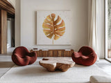 Golden Palm II by Yvette St. Amant. Shown as extra-large giant wall art in a modern living room. Available as an archival giclee rolled canvas, fine art paper, or poster print. SKU 89176a.