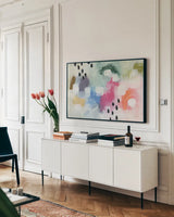Happy Days by Yvette St. Amant. shown as a framed stretched canvas in a living room above a console. Available as a archival giclee rolled canvas, fine art paper, or poster print. SKU 88801i.