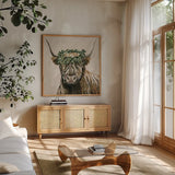 Harvest Cow Sage Square by Yvette St. Amant. Shown in a natural wood frame in a cozy modern living room. Available as an archival giclee rolled canvas, fine art paper, or poster print. SKU 93682a.