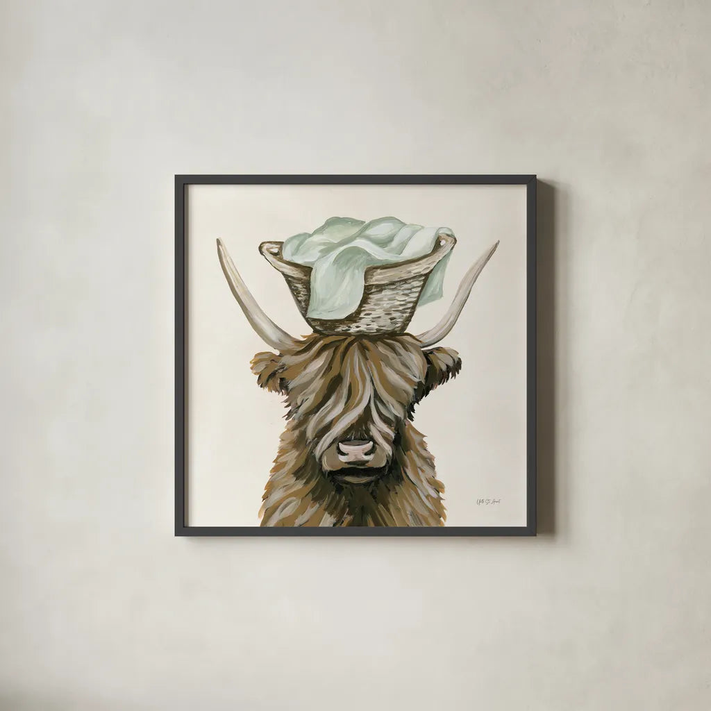 Highland Cow Laundry Basket by Yvette St. Amant. Shown in a sleek black glass frame for a contemporary gallery look. Available as an archival giclee rolled canvas, fine art paper, or poster print. SKU 89453a.