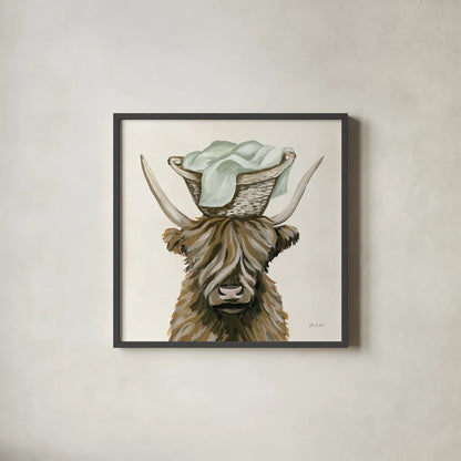 Highland Cow Laundry Basket by Yvette St. Amant. Shown in a sleek black glass frame for a contemporary gallery look. Available as an archival giclee rolled canvas, fine art paper, or poster print. SKU 89453a.