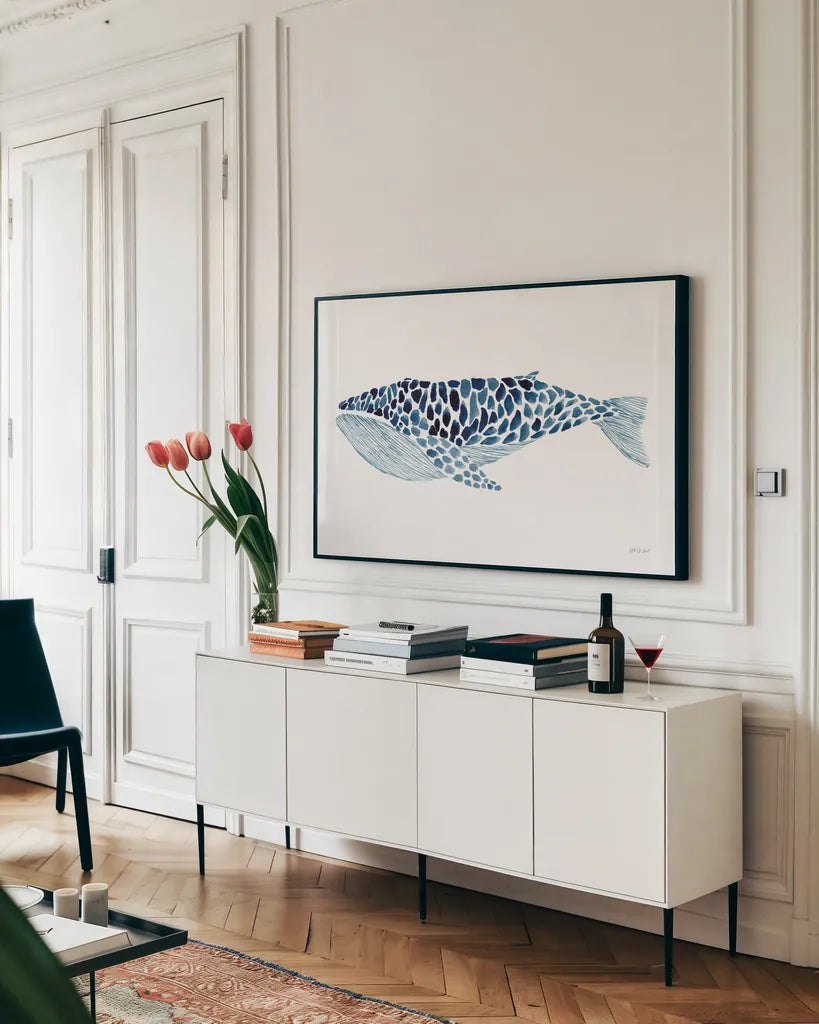 Humpback Whale by Yvette St. Amant. shown as a framed stretched canvas in a living room above a console. Available as a archival giclee rolled canvas, fine art paper, or poster print. SKU 90114i.