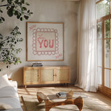 Keepsake Valentine VIII by Yvette St. Amant. Shown in a natural wood frame in a cozy modern living room. Available as an archival giclee rolled canvas, fine art paper, or poster print. SKU 96764a.