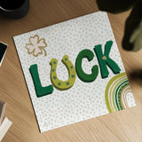Lucky Charm II by Yvette St. Amant. Shown as a detailed flat fine art print, highlighting archival giclee quality. Available as an archival giclee rolled canvas, fine art paper, or poster print. SKU 100558a.