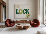 Lucky Charm II by Yvette St. Amant. Shown as extra-large giant wall art in a modern living room. Available as an archival giclee rolled canvas, fine art paper, or poster print. SKU 100558a.