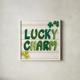 Lucky Charm III by Yvette St. Amant. Shown in a crisp white glass frame for a clean and minimalist style. Available as an archival giclee rolled canvas, fine art paper, or poster print. SKU 100559a.