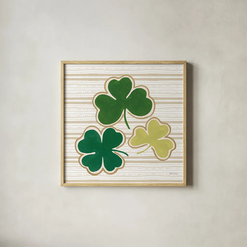 Lucky Charm IV by Yvette St. Amant. Shown in a natural wood glass frame for a timeless modern aesthetic. Available as an archival giclee rolled canvas, fine art paper, or poster print. SKU 100560a.
