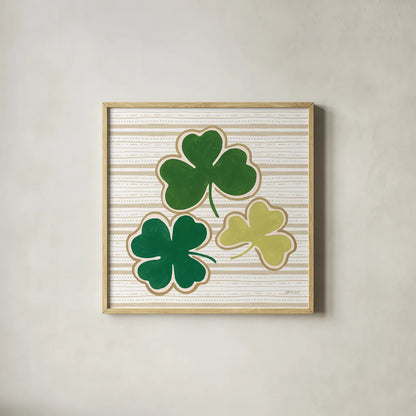 Lucky Charm IV by Yvette St. Amant. Shown in a natural wood glass frame for a timeless modern aesthetic. Available as an archival giclee rolled canvas, fine art paper, or poster print. SKU 100560a.