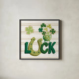 Lucky Charm IX by Yvette St. Amant. Shown in a sleek black glass frame for a contemporary gallery look. Available as an archival giclee rolled canvas, fine art paper, or poster print. SKU 100565a.