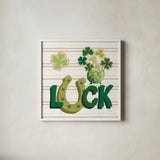Lucky Charm IX by Yvette St. Amant. Shown in a crisp white glass frame for a clean and minimalist style. Available as an archival giclee rolled canvas, fine art paper, or poster print. SKU 100565a.