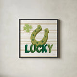 Lucky Charm VI by Yvette St. Amant. Shown in a sleek black glass frame for a contemporary gallery look. Available as an archival giclee rolled canvas, fine art paper, or poster print. SKU 100562a.