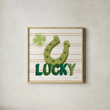 Lucky Charm VI by Yvette St. Amant. Shown in a natural wood glass frame for a timeless modern aesthetic. Available as an archival giclee rolled canvas, fine art paper, or poster print. SKU 100562a.