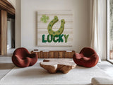 Lucky Charm VI by Yvette St. Amant. Shown as extra-large giant wall art in a modern living room. Available as an archival giclee rolled canvas, fine art paper, or poster print. SKU 100562a.