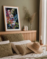 Midnight Floral by Yvette St. Amant. shown as a paper print in a natural frame. Available as a archival giclee rolled canvas, fine art paper, or poster print. SKU 88370h.