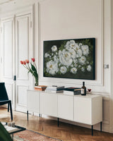 Midnight Roses by Yvette St. Amant. shown as a framed stretched canvas in a living room above a console. Available as a archival giclee rolled canvas, fine art paper, or poster print. SKU 89385i.