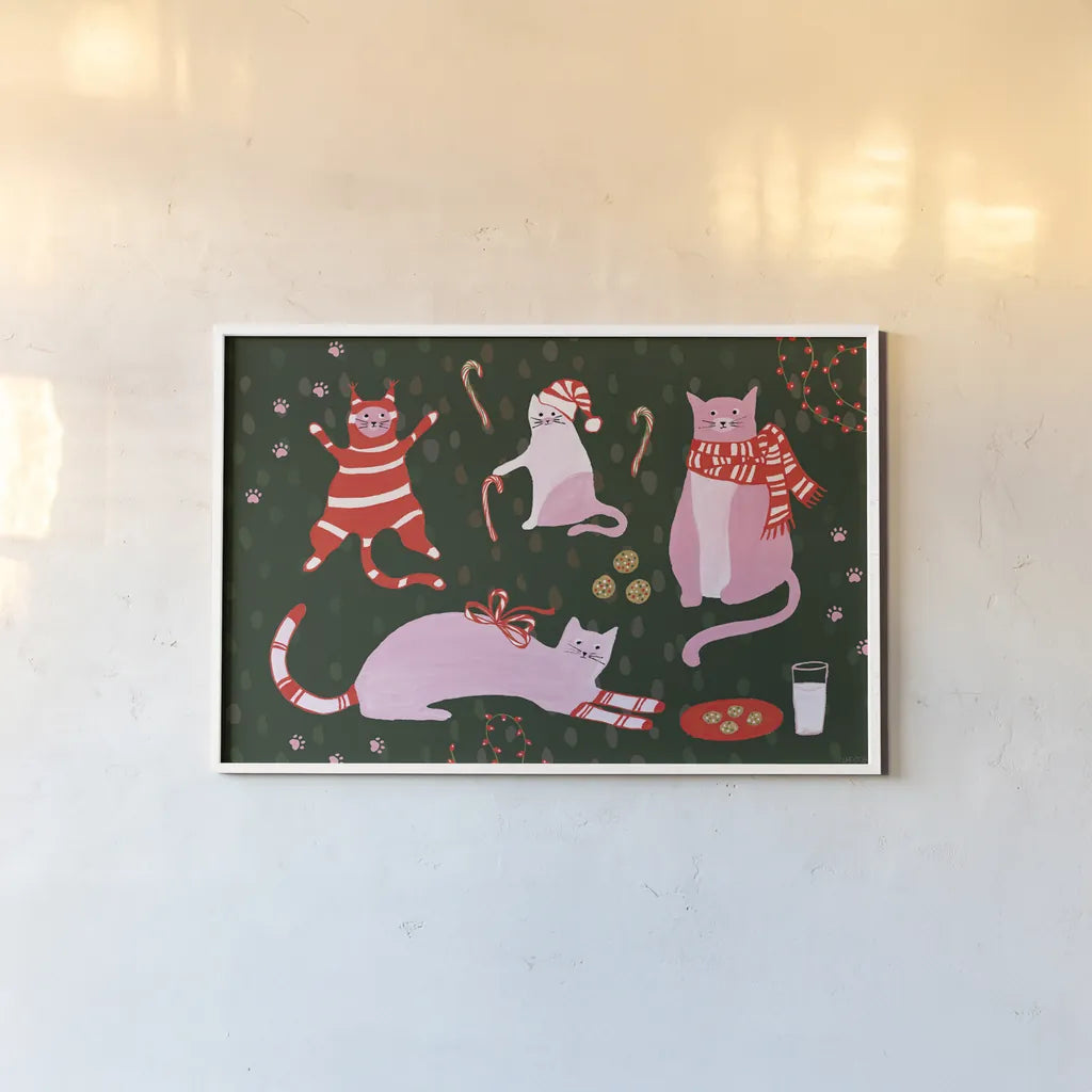 Mischief Kitty Christmas I by Yvette St. Amant. shown as a paper print in a white frame. Available as a archival giclee rolled canvas, fine art paper, or poster print. SKU 97540i.