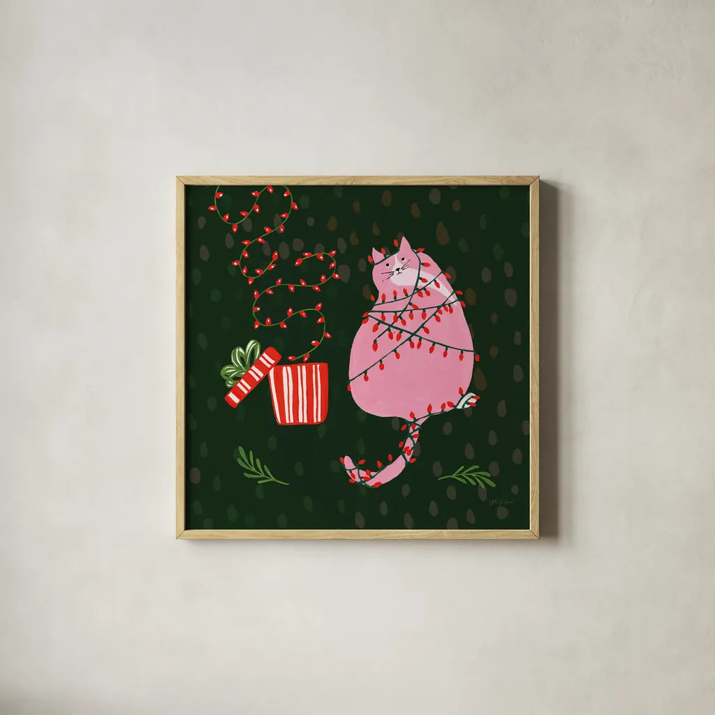 Mischief Kitty Christmas III by Yvette St. Amant. Shown in a natural wood glass frame for a timeless modern aesthetic. Available as an archival giclee rolled canvas, fine art paper, or poster print. SKU 97542a.