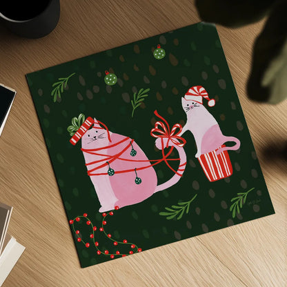 Mischief Kitty Christmas IV by Yvette St. Amant. Shown as a detailed flat fine art print, highlighting archival giclee quality. Available as an archival giclee rolled canvas, fine art paper, or poster print. SKU 97543a.