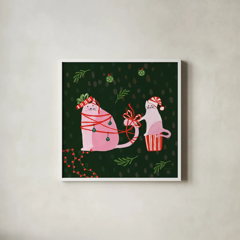 Mischief Kitty Christmas IV by Yvette St. Amant. Shown in a crisp white glass frame for a clean and minimalist style. Available as an archival giclee rolled canvas, fine art paper, or poster print. SKU 97543a.