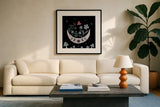 Moon Moth VII by Yvette St. Amant. Displayed in a glass frame with matte in a clean modern living room. Available as an archival giclee rolled canvas, fine art paper, or poster print. SKU 101208a.