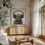 Music Cow Blue Crop by Yvette St. Amant. Shown in a natural wood frame in a cozy modern living room. Available as an archival giclee rolled canvas, fine art paper, or poster print. SKU 90161a.