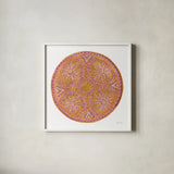 Mustard Mandala by Yvette St. Amant. Shown in a crisp white glass frame for a clean and minimalist style. Available as an archival giclee rolled canvas, fine art paper, or poster print. SKU 88261a.
