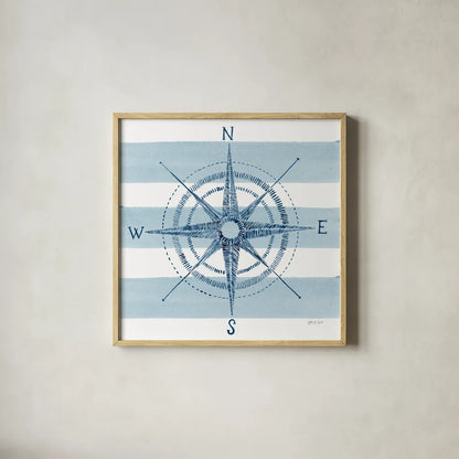 Nautical Compass by Yvette St. Amant. Shown in a natural wood glass frame for a timeless modern aesthetic. Available as an archival giclee rolled canvas, fine art paper, or poster print. SKU 90122a.