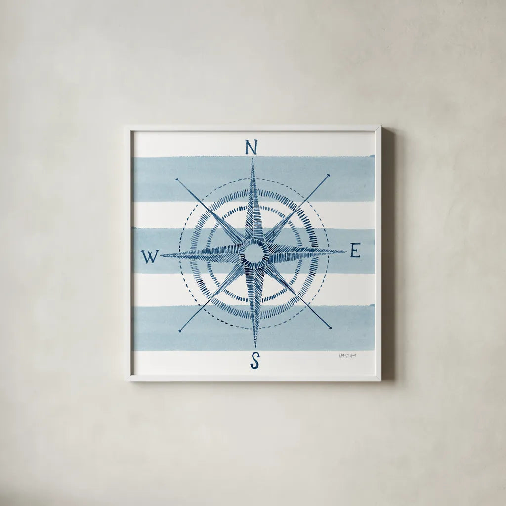 Nautical Compass by Yvette St. Amant. Shown in a crisp white glass frame for a clean and minimalist style. Available as an archival giclee rolled canvas, fine art paper, or poster print. SKU 90122a.