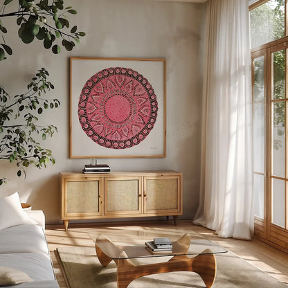 Pink Mandala by Yvette St. Amant. Shown in a natural wood frame in a cozy modern living room. Available as an archival giclee rolled canvas, fine art paper, or poster print. SKU 88260a.